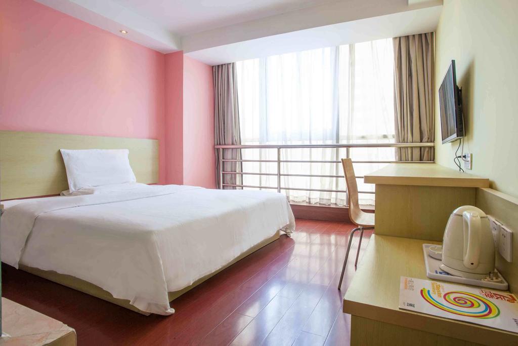 7Days Inn Jiangmen Peng Jiang Qiao North Quarto foto