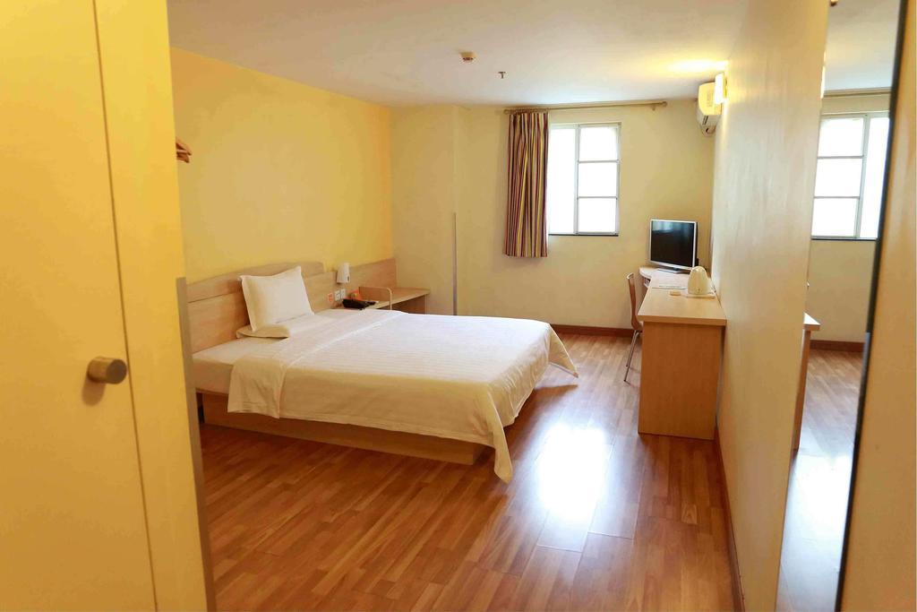 7Days Inn Jiangmen Peng Jiang Qiao North Quarto foto