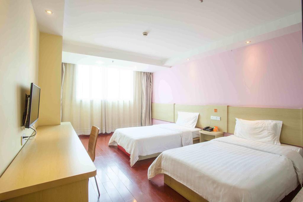 7Days Inn Jiangmen Peng Jiang Qiao North Quarto foto